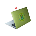 Matte laptop skin with an illustration of a girl reading on a couch with the text 'Simple joys, cozy life'
