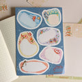 Sheet of writable washi paper stickers featuring various cute cat illustrations for planners and journals.